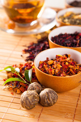 Various dry tea in small bowls