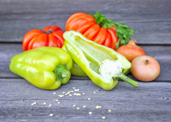Fresh sweet green peppers with onion and tomatoes