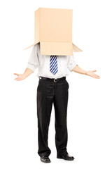 Man standing and gesturing with a cardboard box on his head