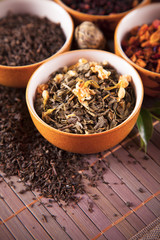Various dry tea in small bowls