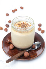 chocolate and coffee yogurt with nuts in glass jar
