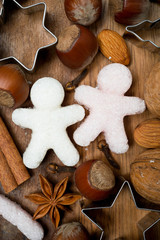ingredients for Christmas baking and sugar little men, vertical