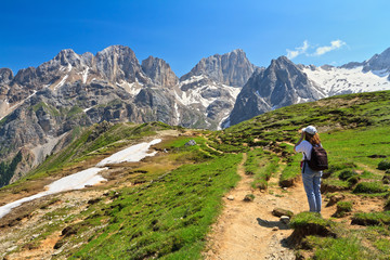 Fototapeta na wymiar Dolomiti - hiker in Contrin Valley