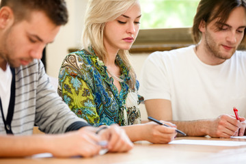 Fototapeta premium female college student sitting in a classroom