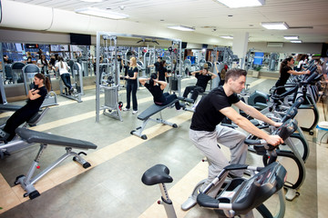 Fototapeta na wymiar People workout at gym