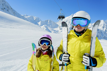 Fototapeta na wymiar Ski, ski resort, winter sports - family on ski vacation