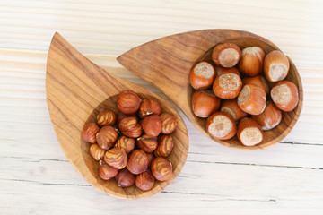 Hazelnuts with and without shell, close up