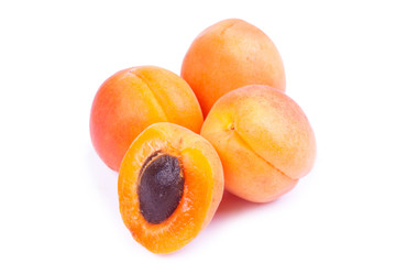 Ripe apricot fruit isolated on white background.