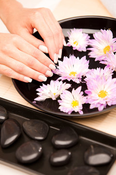 Woman's hands at spa procedure