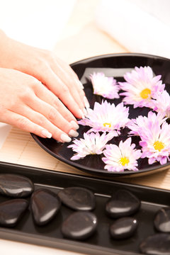 Woman's hands at spa procedure
