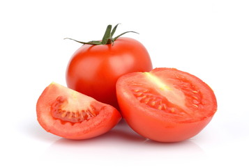 Sliced red delicious tomatoes isolated on white