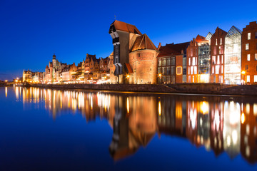 Old town of Gdansk with ancient crane at night, Poland - obrazy, fototapety, plakaty
