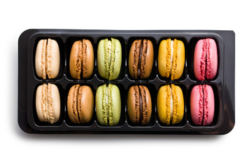 colorful macaroons in plastick box