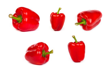set of red bell sweet peppers isolated on white