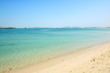 Beach of the luxury hotel with a view on Palm Jumeirah man-made