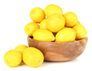 Ripe lemons in bowl isolated on white