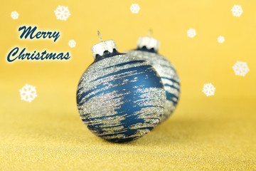 Christmas balls on yellow background