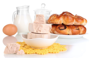 Dry yeast with pastry and baking ingredients isolated on white