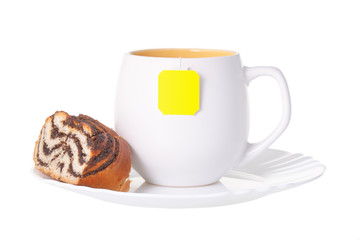 A cup of tea with a cake without a shadow