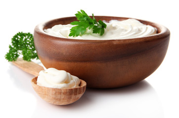 Sour cream in bowl isolated on white