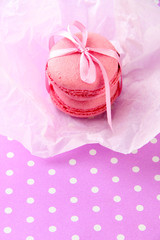 Gentle macaroons on table close-up