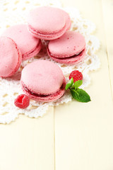 Gentle macaroons on table close-up
