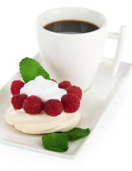 Tasty meringue cake with berries and cup of coffee, isolated