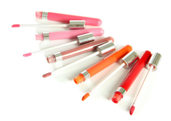 Beautiful lip glosses, isolated on white