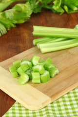 Fresh green celery on table close-up