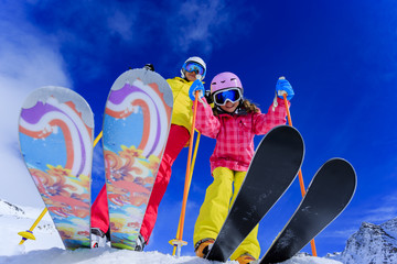 Ski, snow, sun and fun - skiers enjoying winter