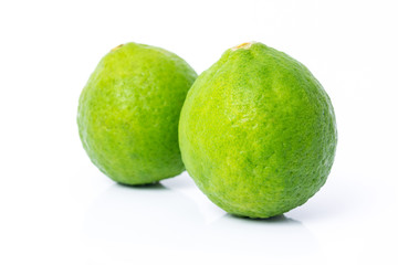 Fresh limes Isolated on white background