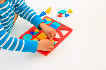 child learning shapes, early education