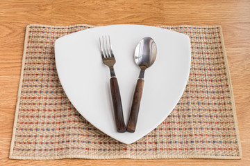 Spoon and fork on Triangular dishes