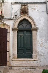 Wooden door. Noci. Puglia. Italy.