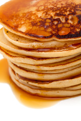 Stack of pancakes isolated on white