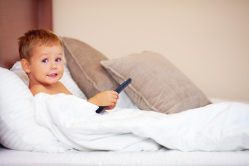 Obraz na płótnie Canvas child, caught on watching banned tv program