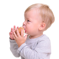 baby eats bread