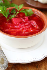 red borscht with bread rolls