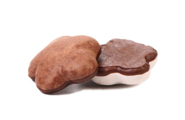 Two heart shape chocolate meringues.
