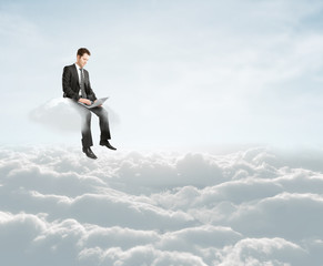 businessman  sitting on cloud