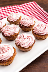 Obraz na płótnie Canvas Pink raspberry cupcakes