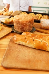 Woman hands holding plate with homemade baked goods