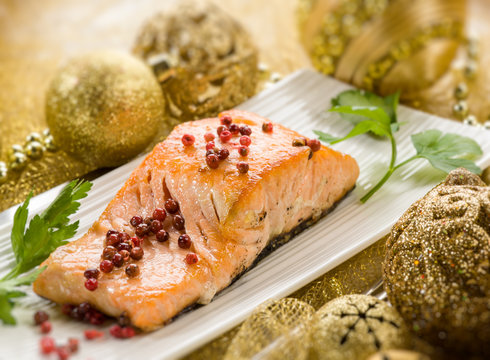 Grilled Salmon With Pink Pepper On Christmas Table