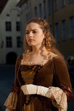 Medieval style girl at the street of  tallinn