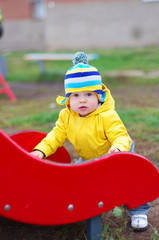 baby age of 1 year on playground