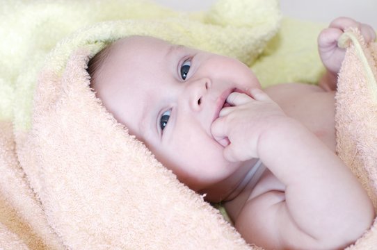 Baby Age Of 4 Months In Towel After Bath