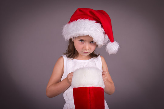 Little Girl Disapointed With Her Christmas Stocking