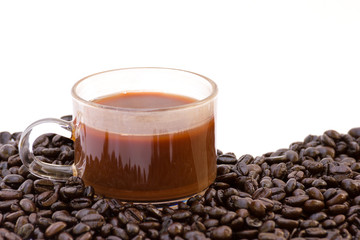 Coffee cup and beans isolated on a white background