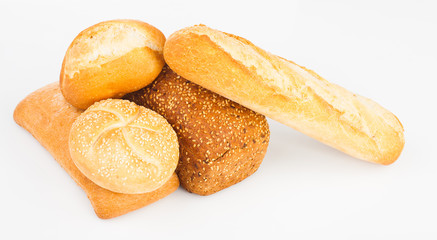 assortment of baked bread isolated on white background
