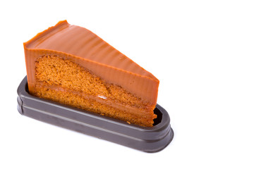 Thai tea layer cake with mold isolated on white background